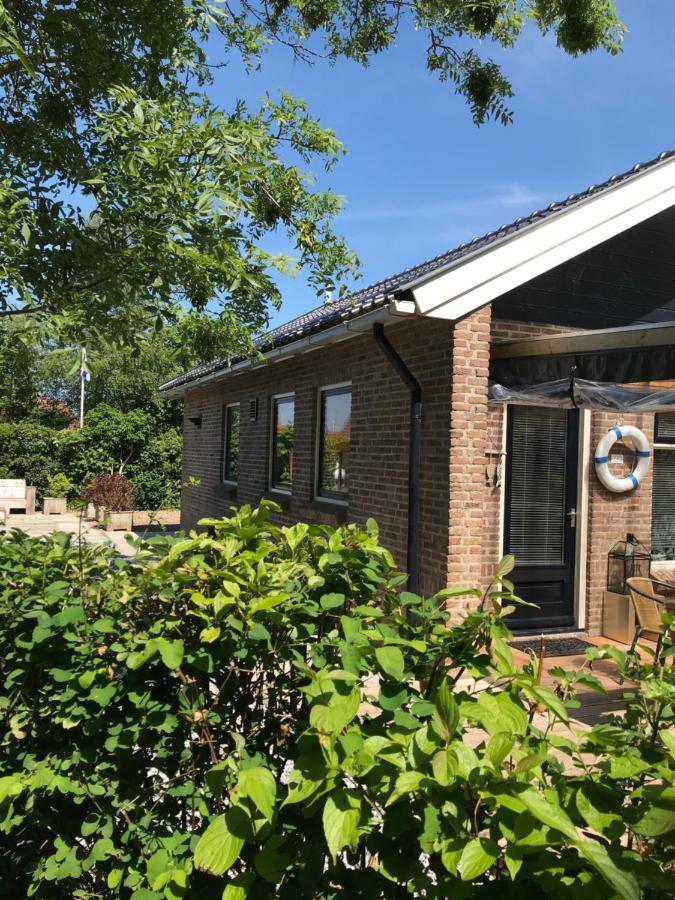 BelleMare Bungalow Lauwersmeer mit eingezäuntem Garten Anjum Exterior foto